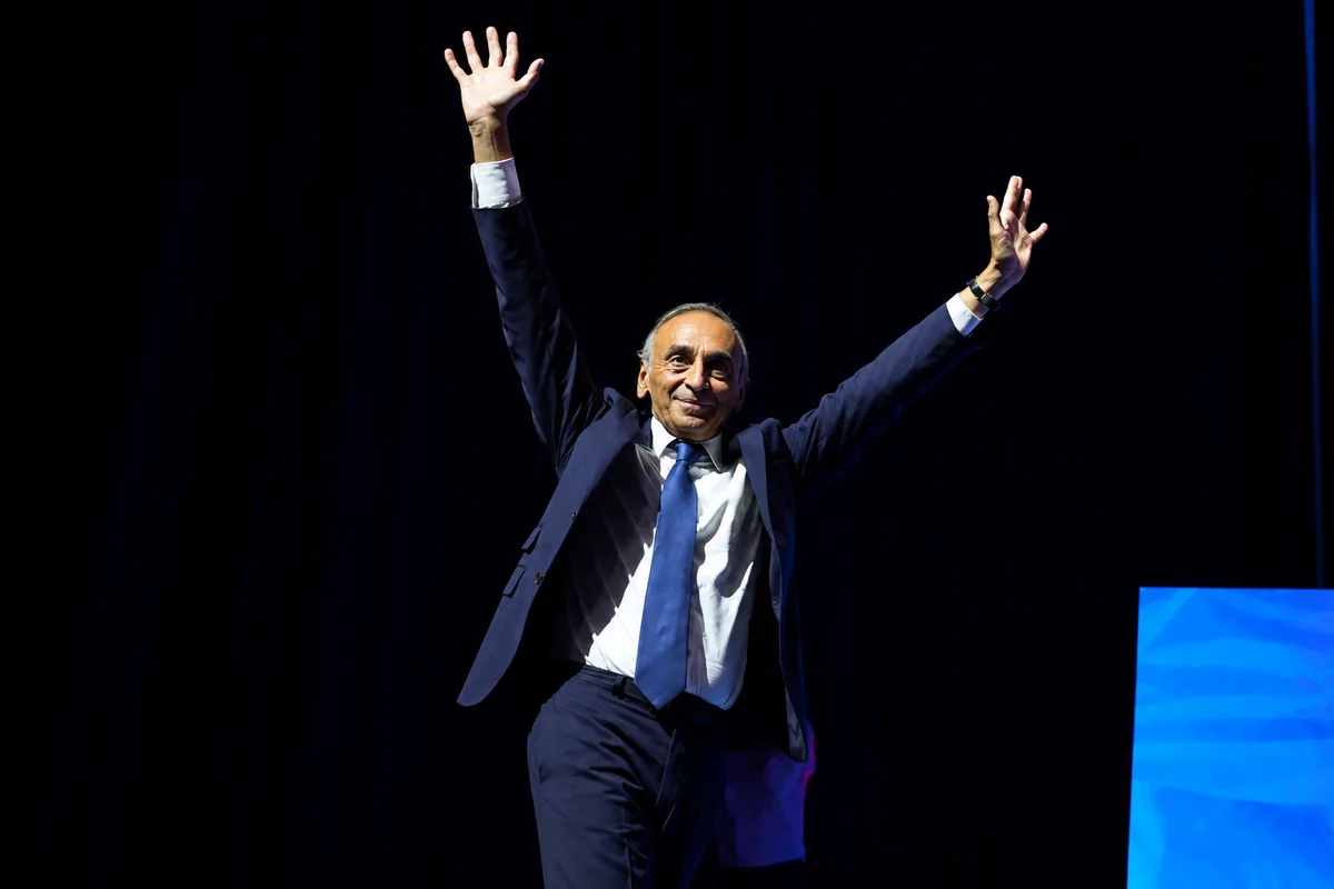 French far-right Reconquête party leader Eric Zemmour waves to supporters (SIMON WOHLFAHRT/AFP)
