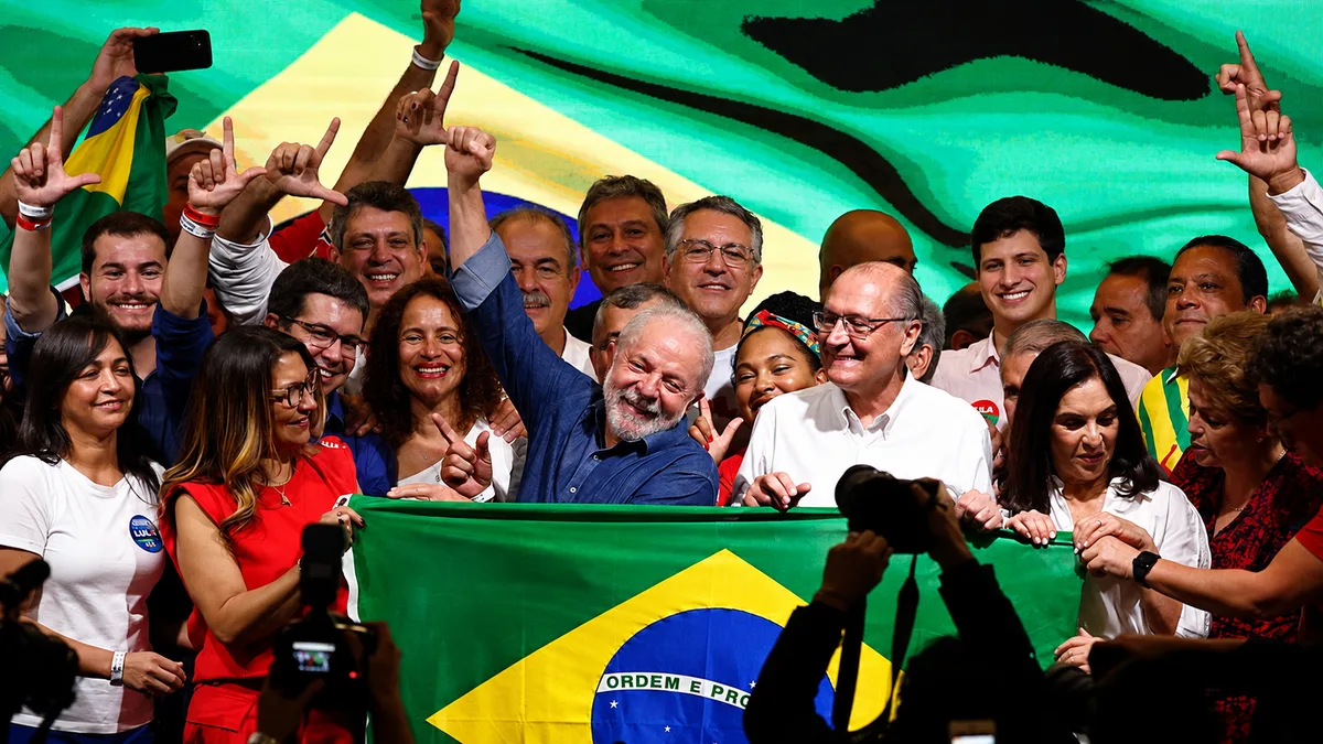 Luiz Inácio Lula da Silva celebrates alongside supporters during his 2022 presidential election campaign (Reuters).